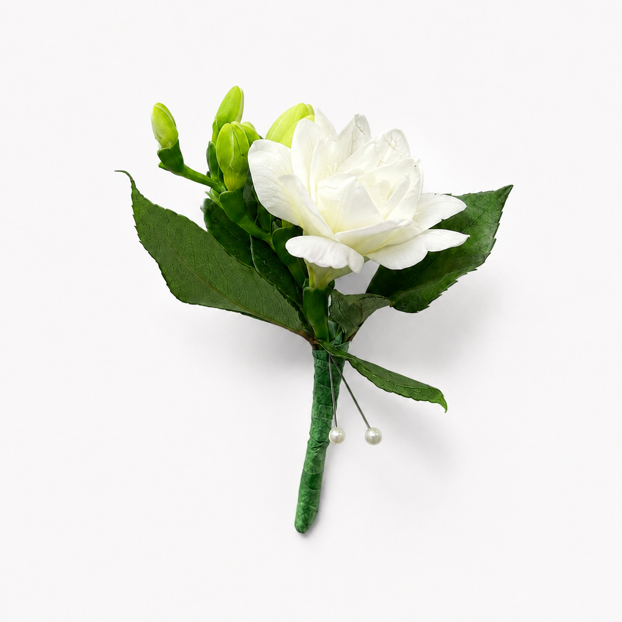 Classic White Freesia Boutonnière with white freesia bloom and greenery by Heather Floral NYC