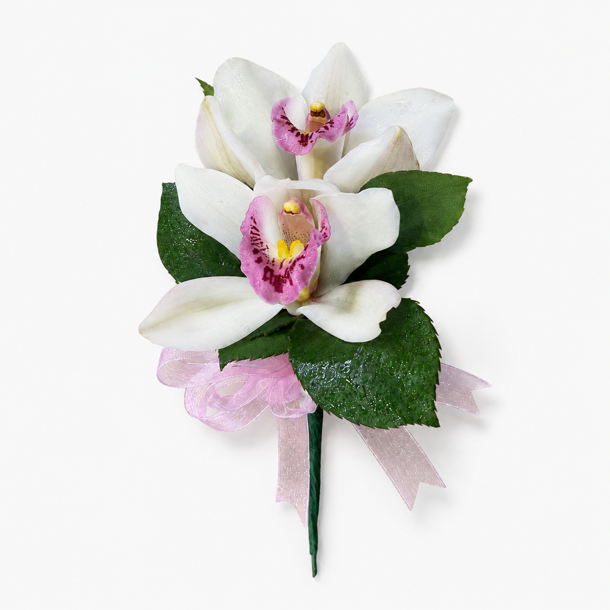 Elegant white cymbidium orchid lapel corsage with blush ribbon, greenery, and pearl accents by Heather Floral NYC