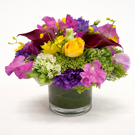 Sweet Vibrations luxury flower arrangement by Heather Floral – fresh orchids and mixed blooms with free same day flower delivery in Manhattan NYC